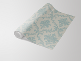 Damask pattern vintage wallpaper with blue details, featuring swirling floral designs.