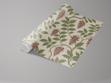 Floral wallpaper roll with wine and willow pattern on beige background.